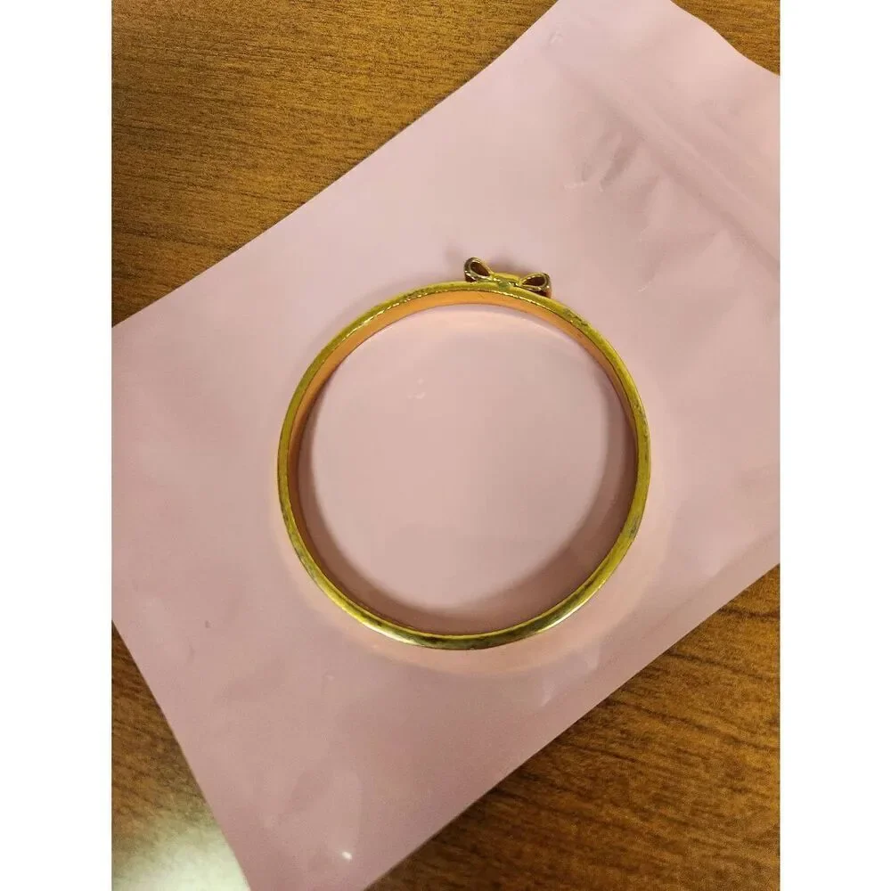 Kate Spade Goldtone bow bangle (PF) - Picture 7 of 7